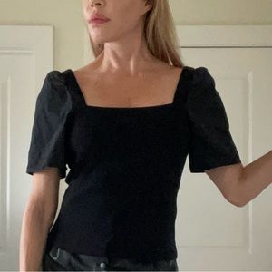 1.State black top w puff sleeves and tailored body.